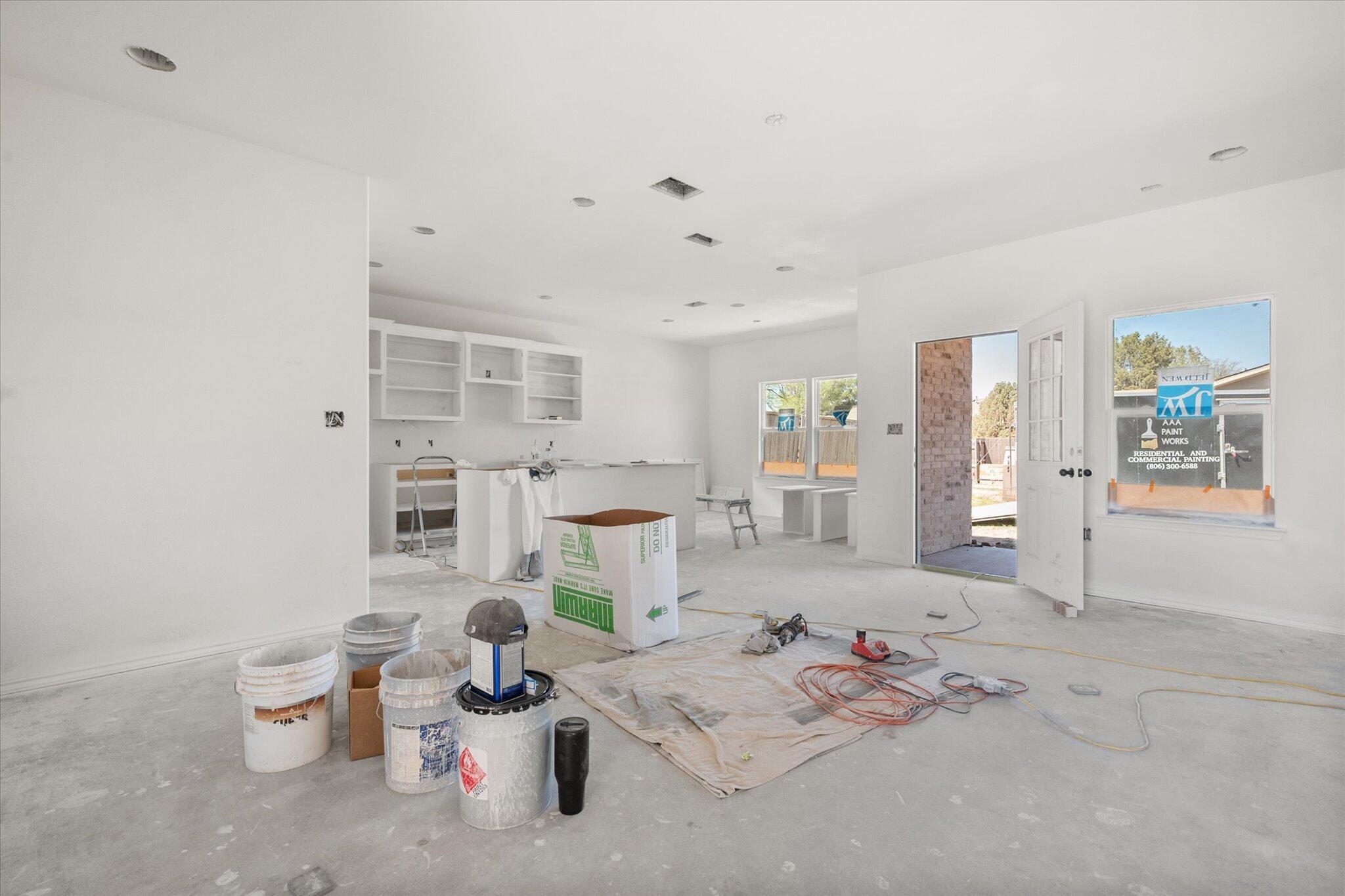 6412 38th Street Lubbock, TX 79407 - Photo 9 of 20 a living room with furniture and white walls