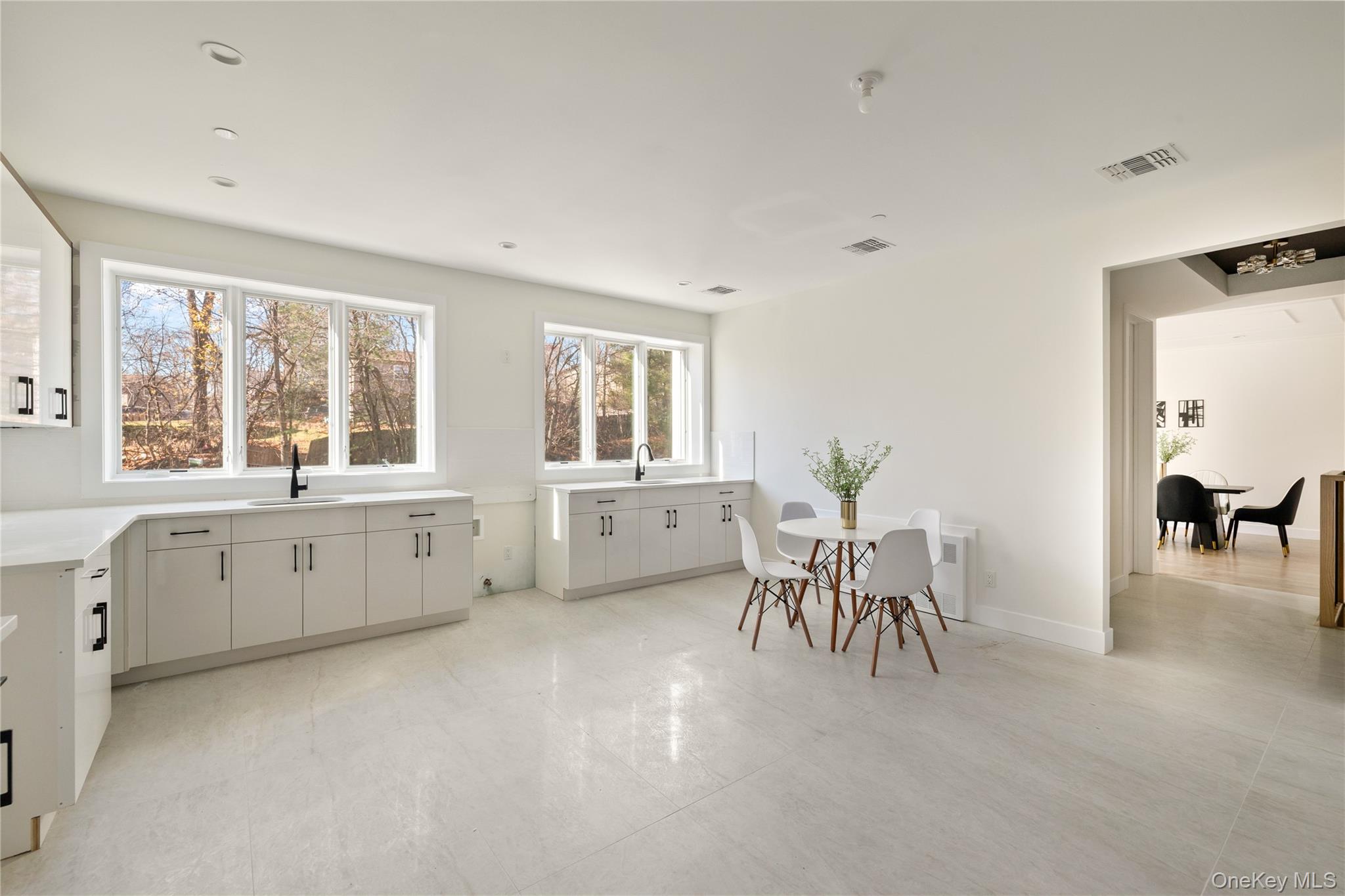 9 Valley Way, Unit 320 Spring Valley, NY 10977 - Photo 12 of 41 a large white room with furniture and windows