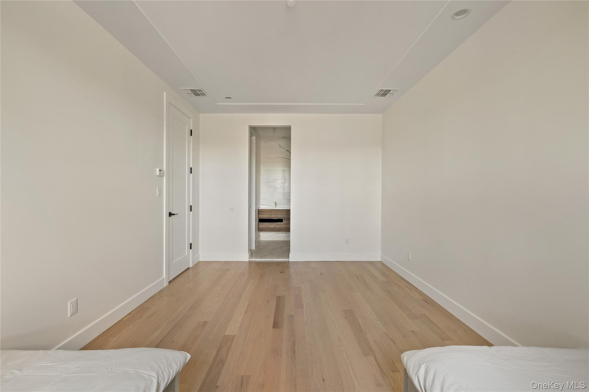 9 Valley Way, Unit 320 Spring Valley, NY 10977 - Photo 25 of 41 a view of wooden floor in an empty room