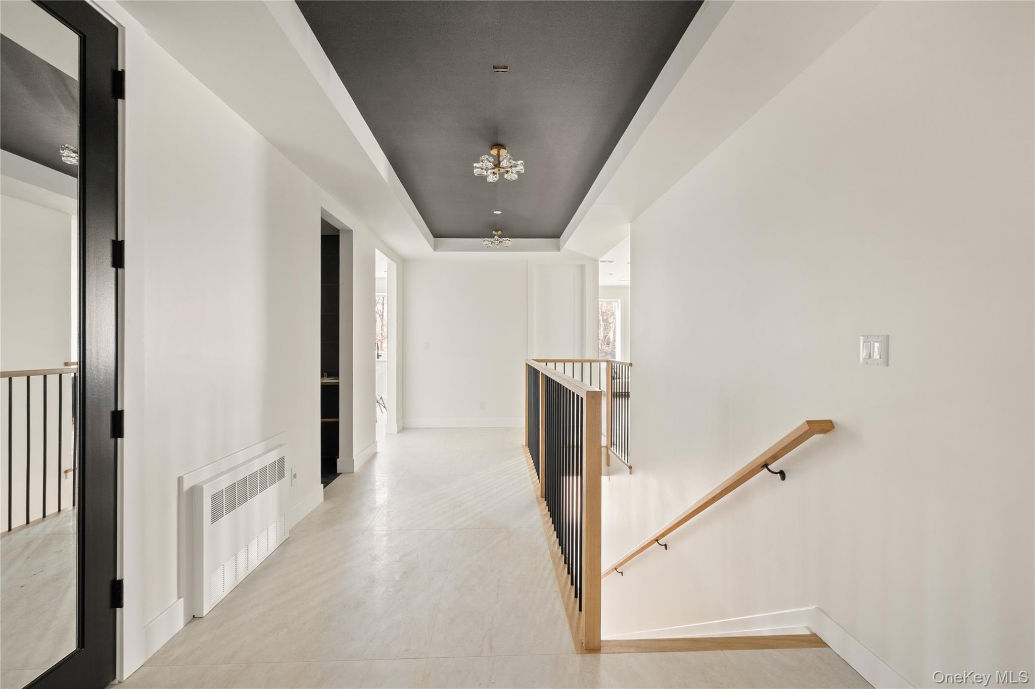 9 Valley Way, Unit 320 Spring Valley, NY 10977 - Photo 7 of 41 a view of a hallway with staircase