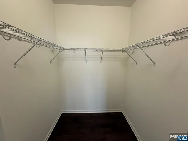 a view of a room with racks on the wall