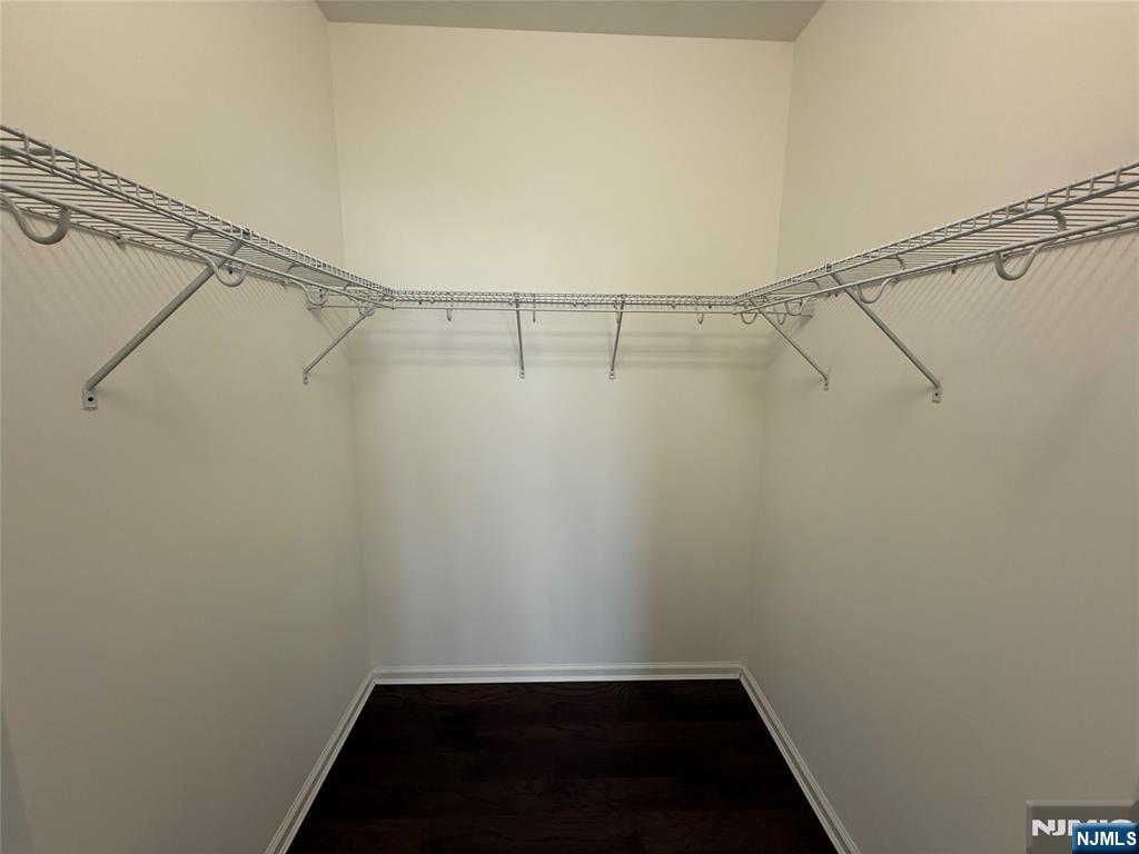 2001 Hudson Terrace, Unit 302 Fort Lee, NJ 07024 - Photo 8 of 16 a view of a room with racks on the wall