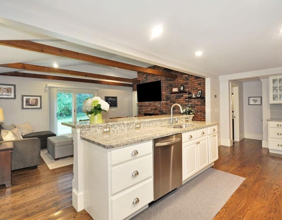 333 Depot Road Boxborough, MA 01719 - Photo 15 of 38 a kitchen with stainless steel appliances granite countertop a sink and cabinets