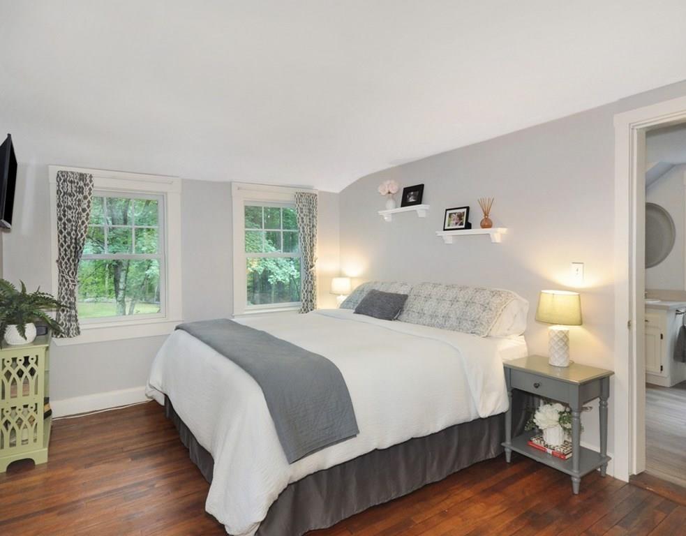 333 Depot Road Boxborough, MA 01719 - Photo 25 of 38 a bedroom with a bed and a window