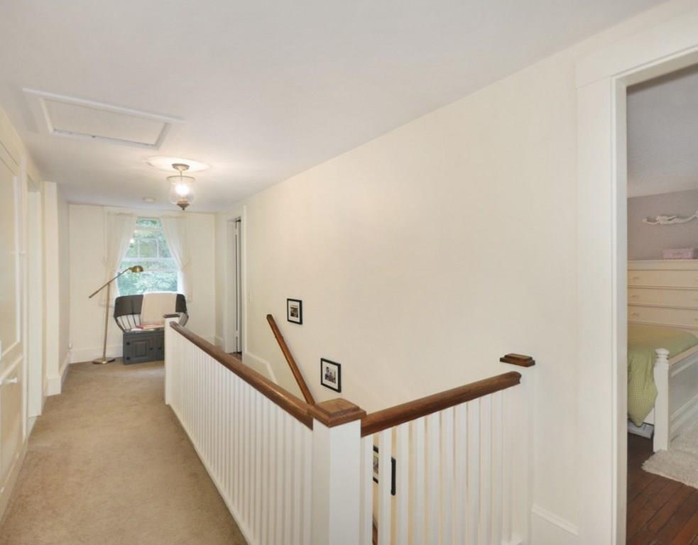 333 Depot Road Boxborough, MA 01719 - Photo 30 of 38 a view of a hallway with a white walls