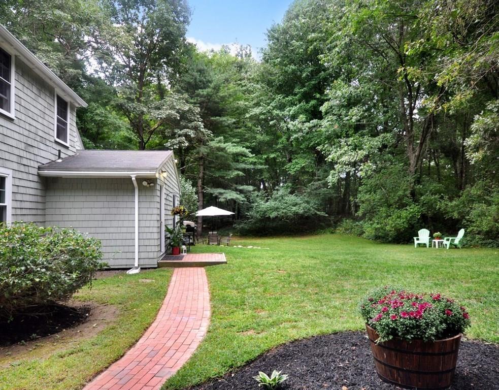 333 Depot Road Boxborough, MA 01719 - Photo 33 of 38 a view of a garden with a patio