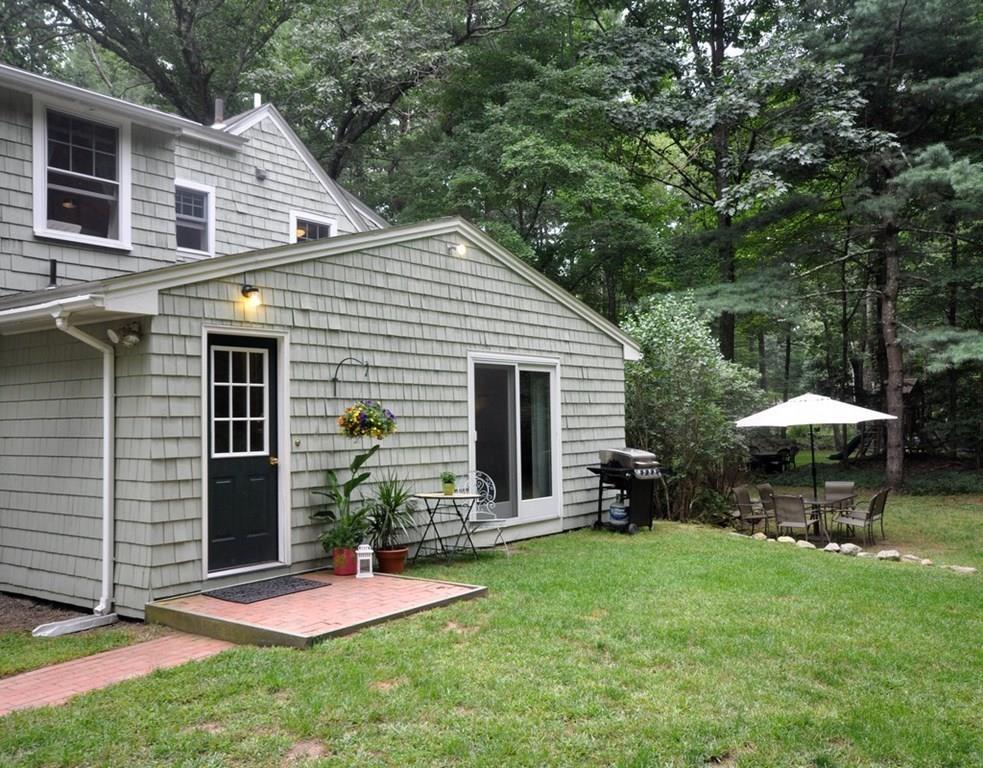 333 Depot Road Boxborough, MA 01719 - Photo 34 of 38 a view of a house with backyard and sitting area