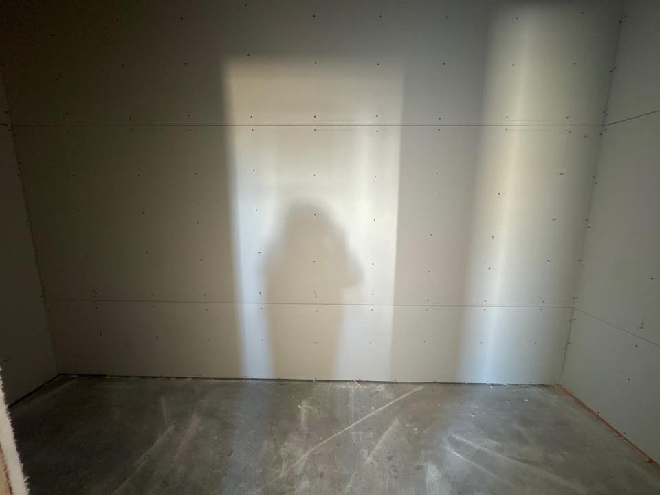 104 Snowy Owl Trail Rhome, TX 76078 - Photo 9 of 10 an empty room with a bench