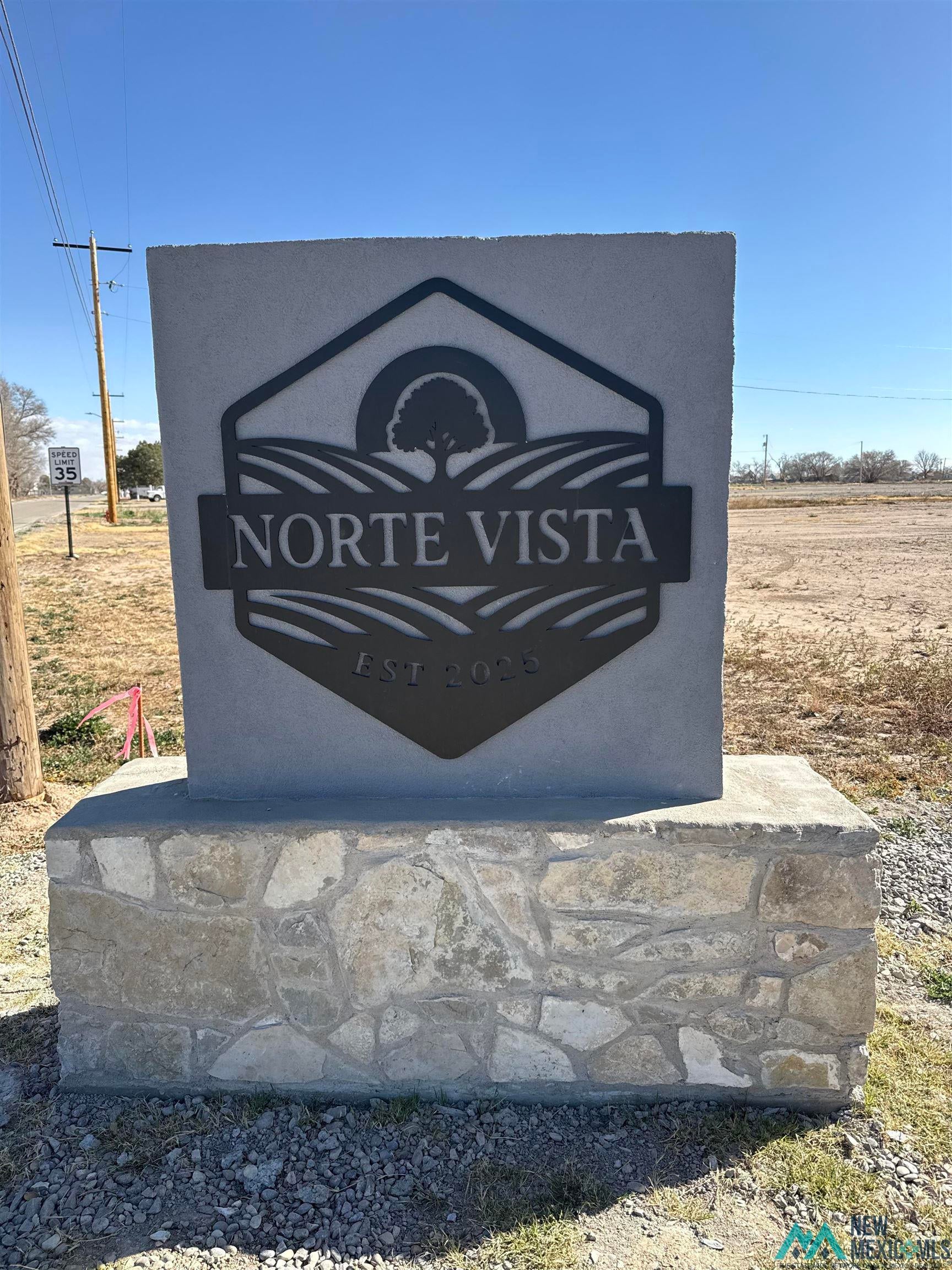 12 Norte Loop Pinon, NM 88344 - Photo 7 of 9 View of community sign
