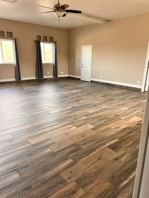 3019 Lathrop Road Manteca, CA 95336 - Photo 41 of 43 a view of a room with window and wooden floor