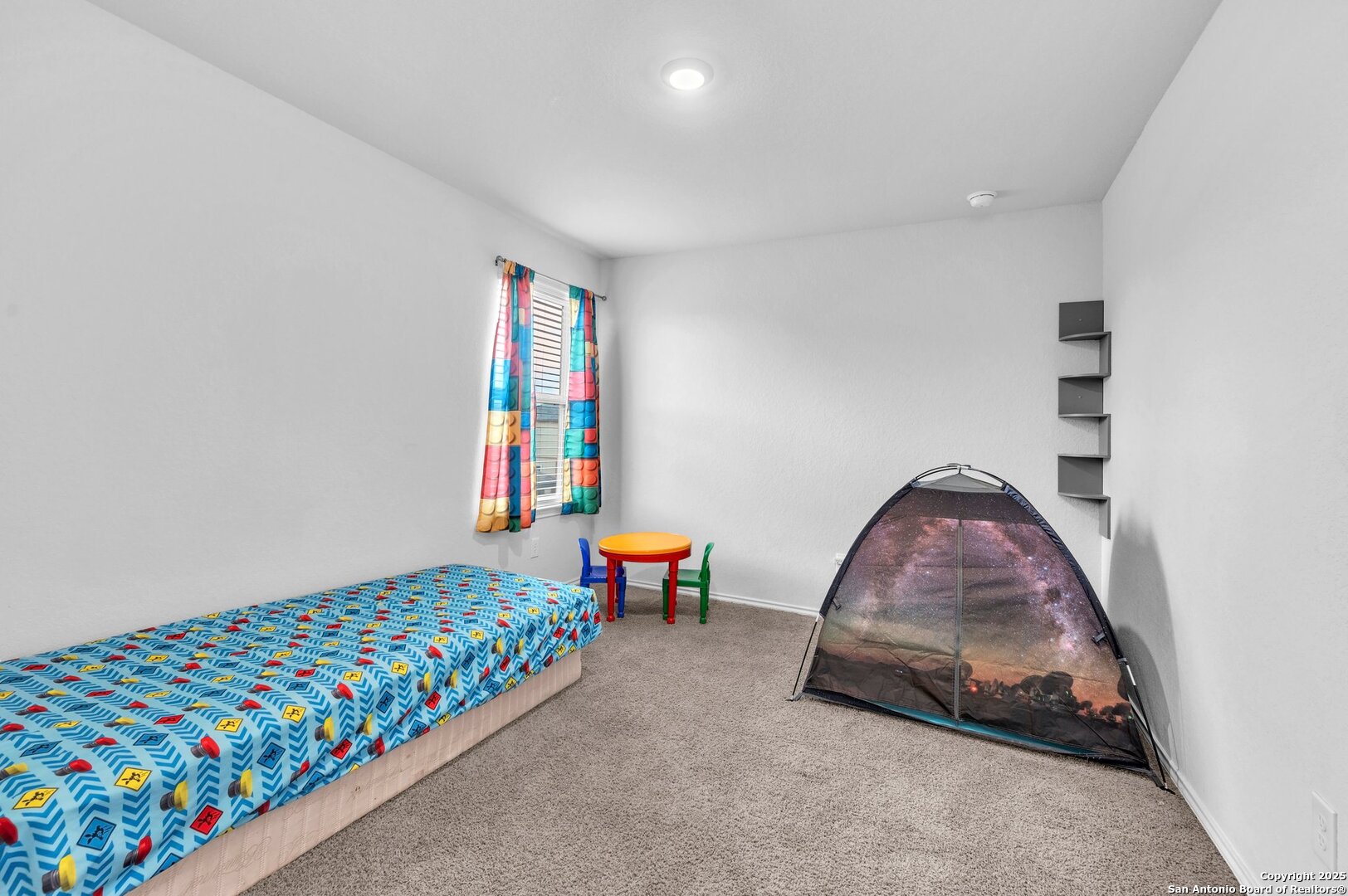14016 Breccia Loop San Antonio, TX 78253 - Photo 19 of 31 a room with toys and a table