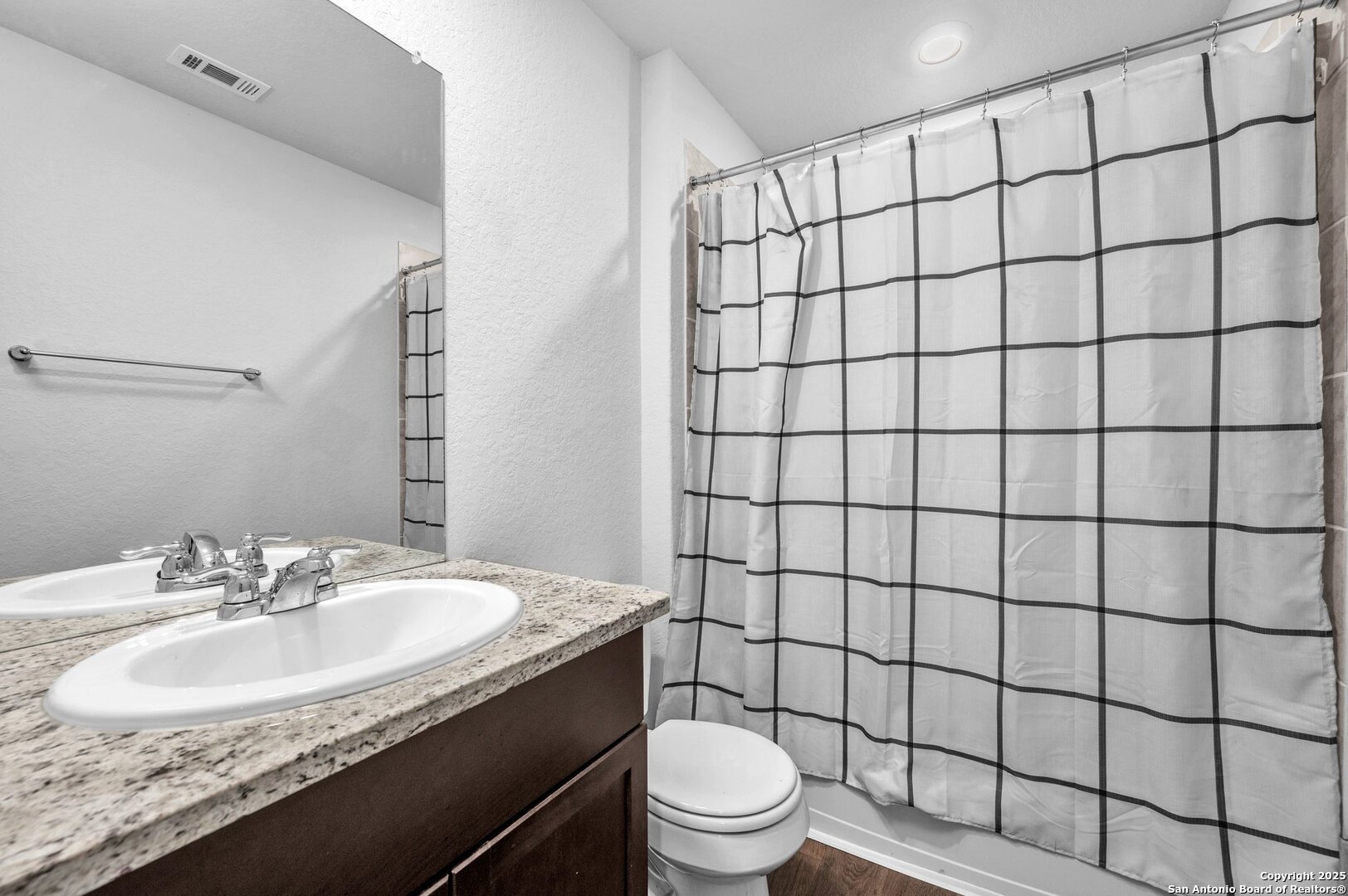 14016 Breccia Loop San Antonio, TX 78253 - Photo 20 of 31 a bathroom with a sink toilet and shower