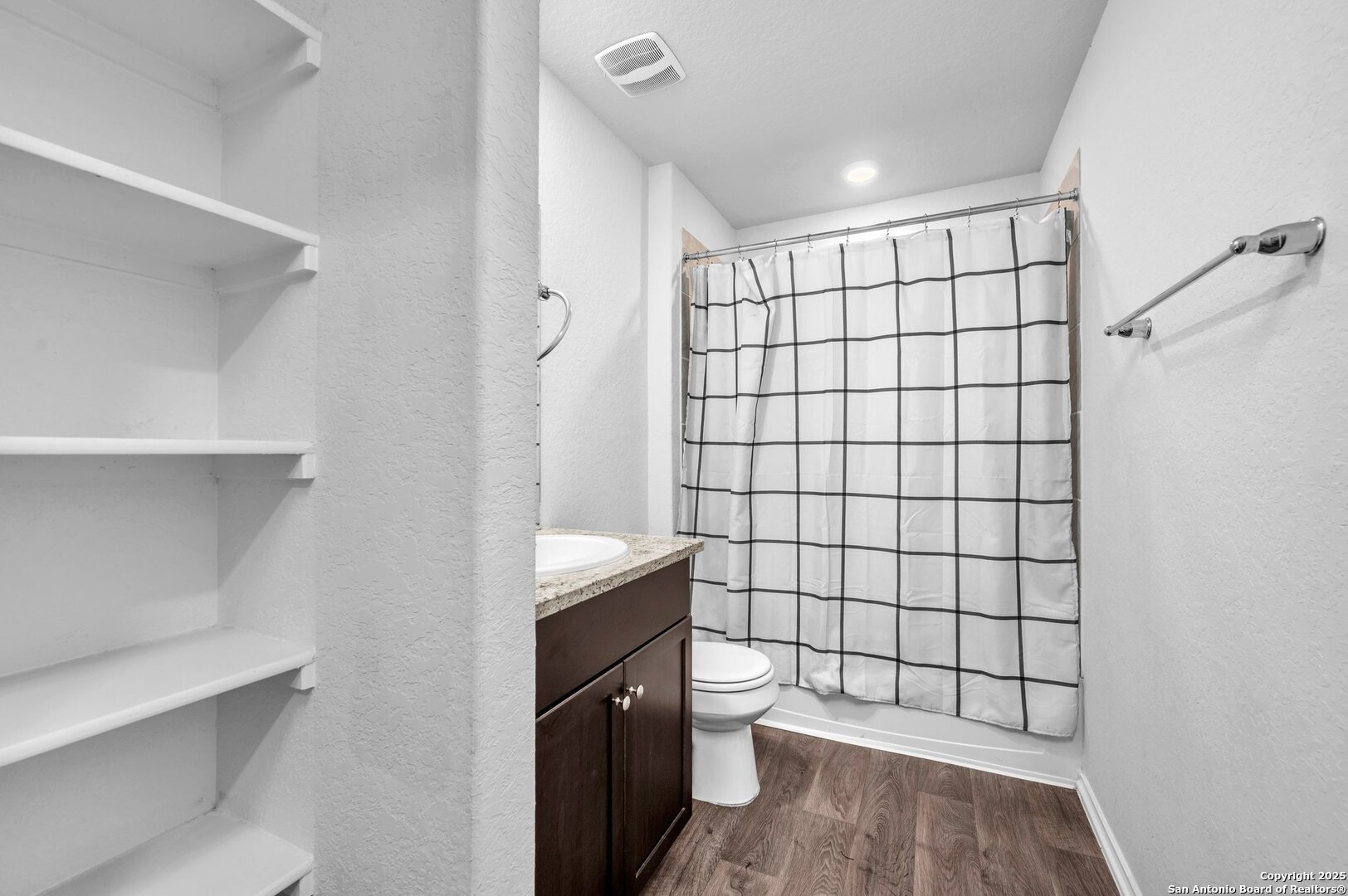 14016 Breccia Loop San Antonio, TX 78253 - Photo 21 of 31 a bathroom with a toilet and a shower