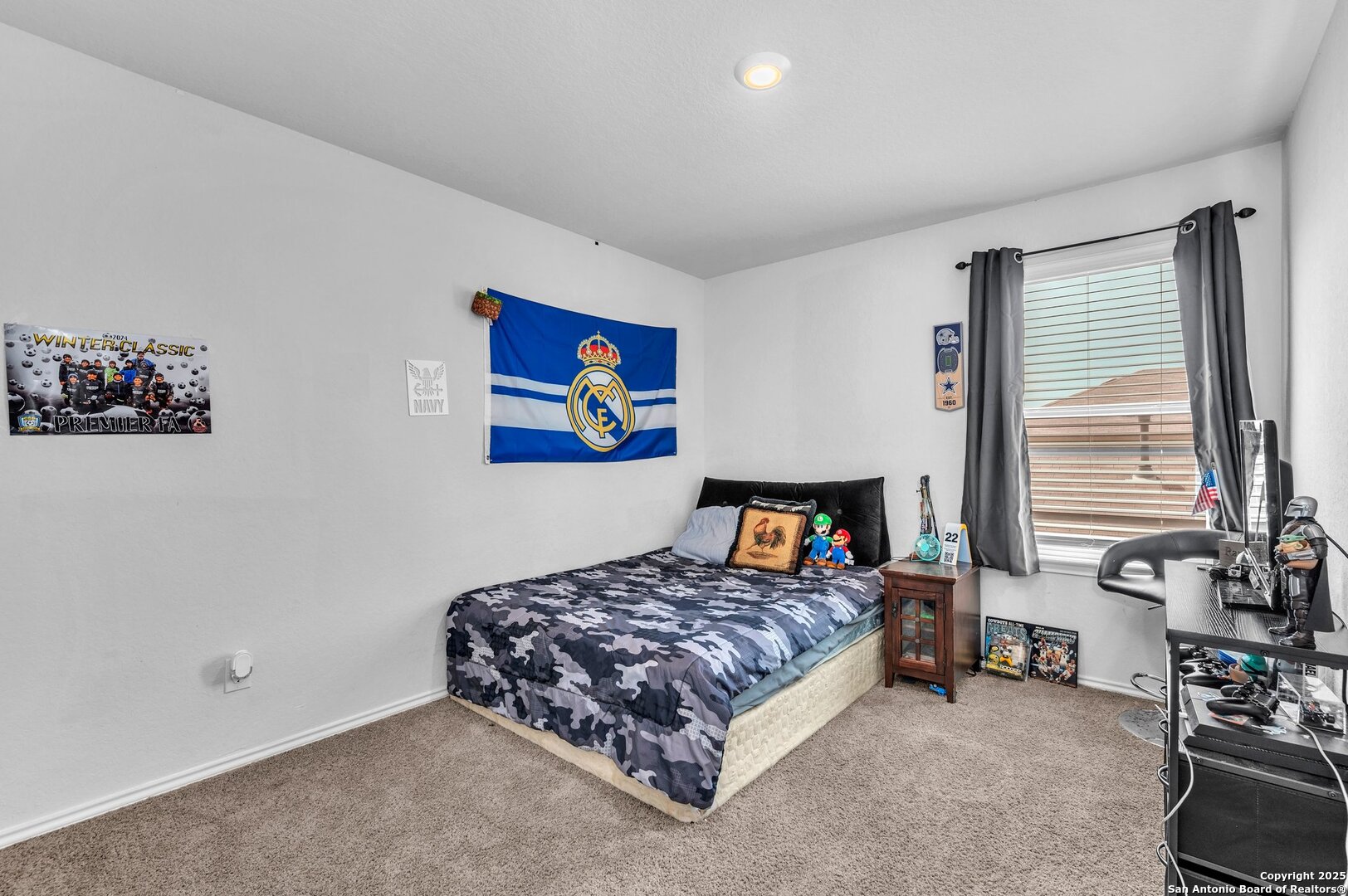 14016 Breccia Loop San Antonio, TX 78253 - Photo 23 of 31 a bedroom with a bed and a couch