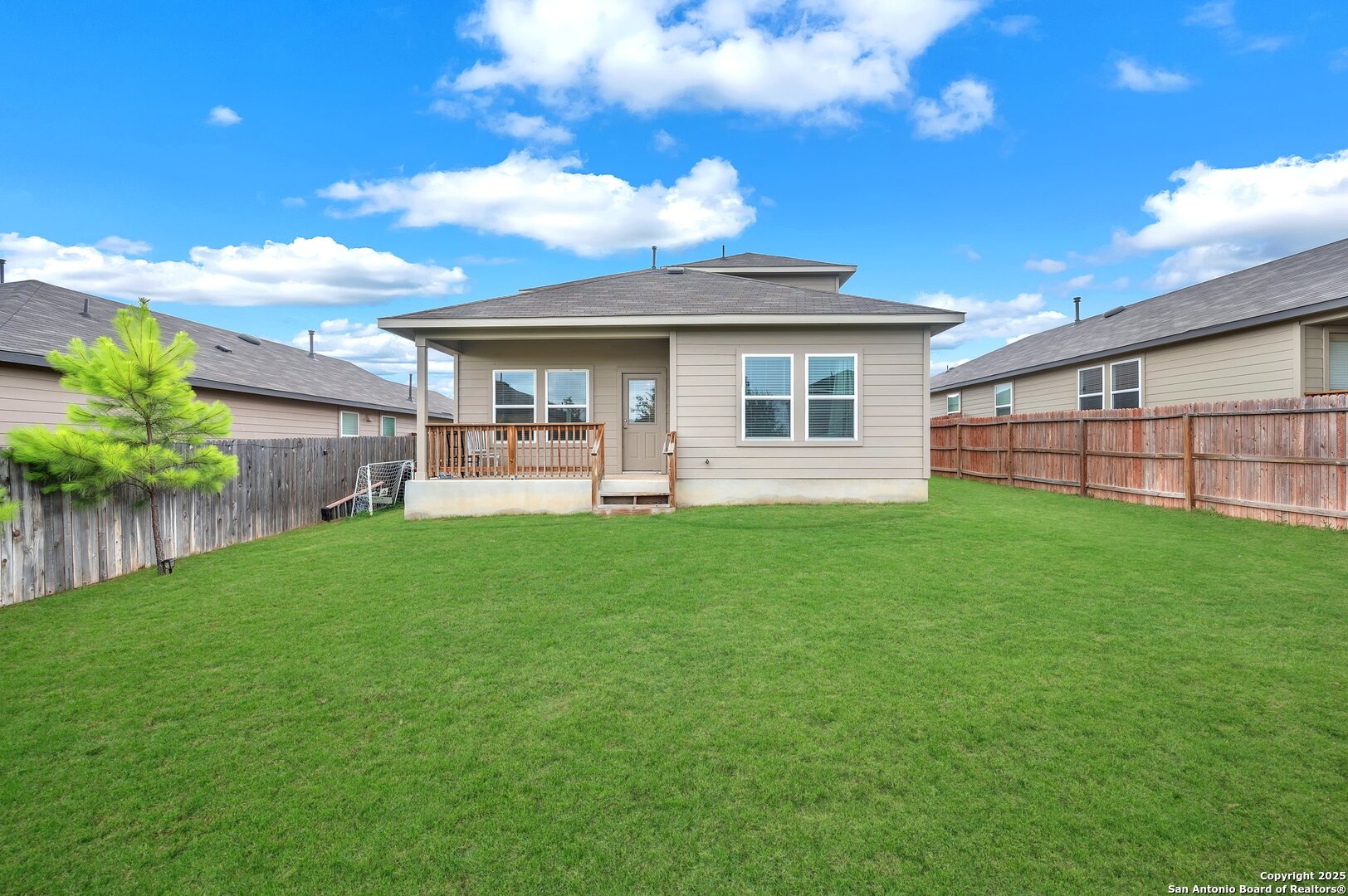 14016 Breccia Loop San Antonio, TX 78253 - Photo 25 of 31 a view of a house with a backyard