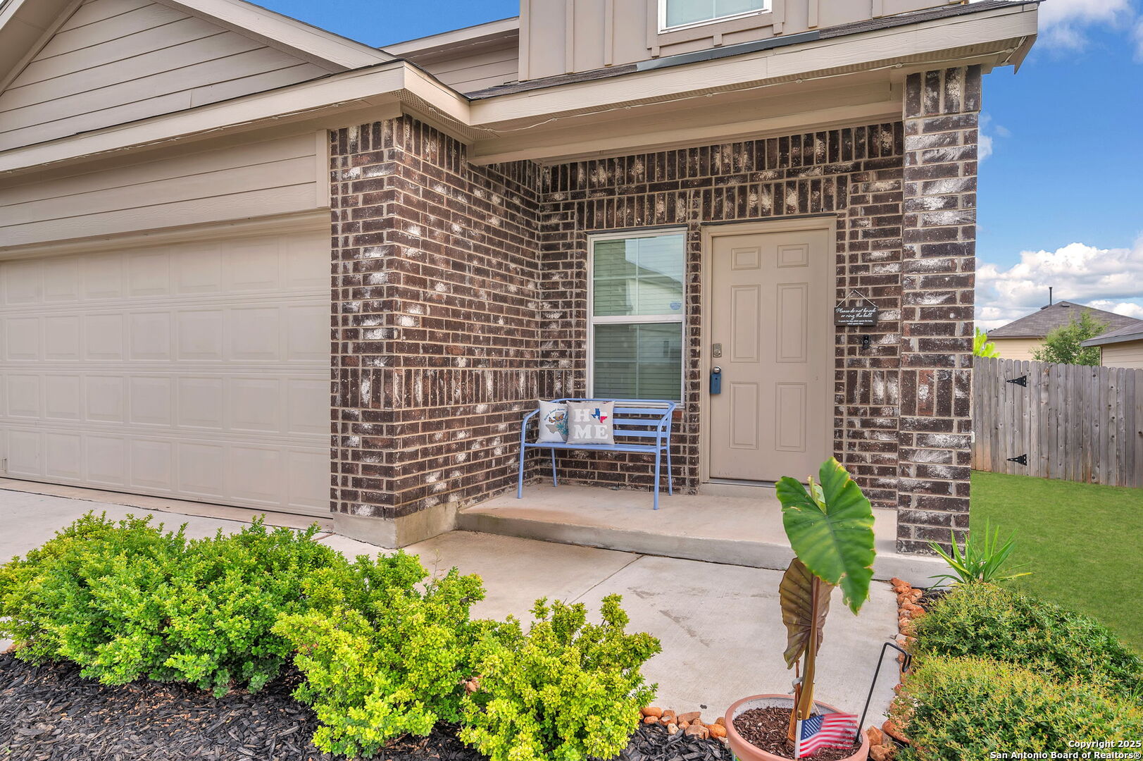 14016 Breccia Loop San Antonio, TX 78253 - Photo 3 of 31 a front view of a house with outdoor seating and plants