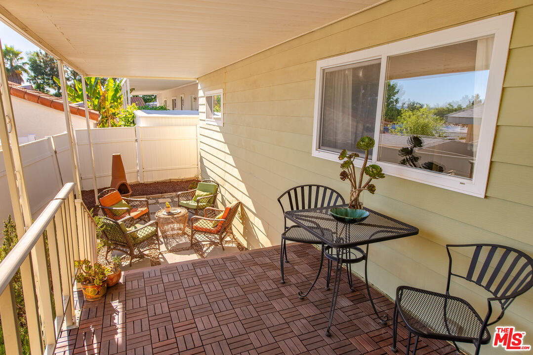 1205 Supi Topanga, CA 90290 - Photo 18 of 24 a view of a chairs and table in a patio