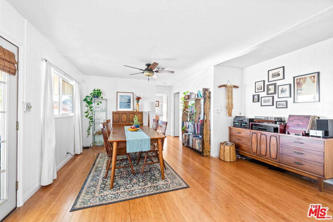 1205 Supi Topanga, CA 90290 - Photo 8 of 24 a living room with furniture and wooden floor
