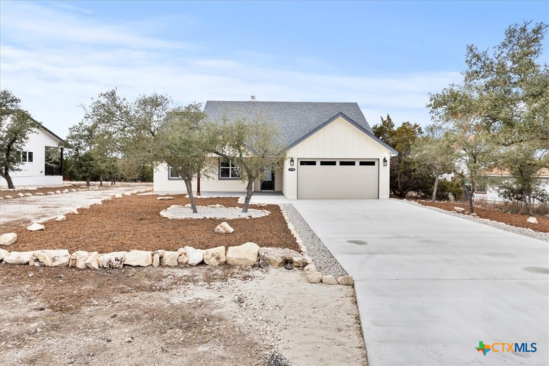 1190 Fernwood Road Fischer, TX 78623 - Photo 3 of 27 a view of backyard of the house