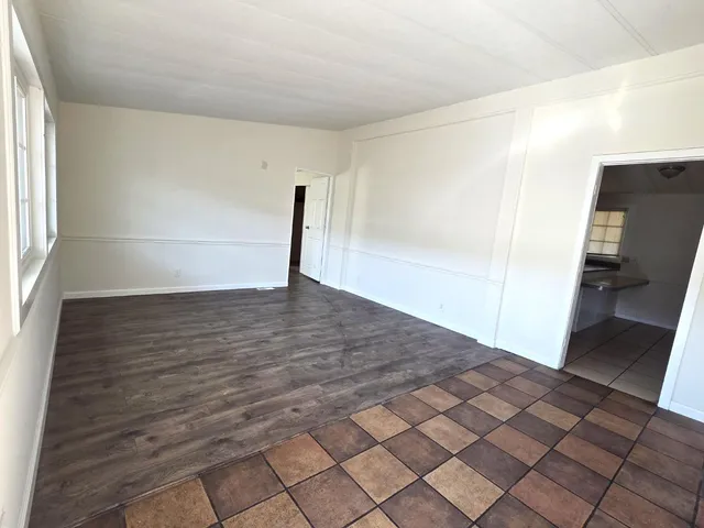 a view of an empty room and window