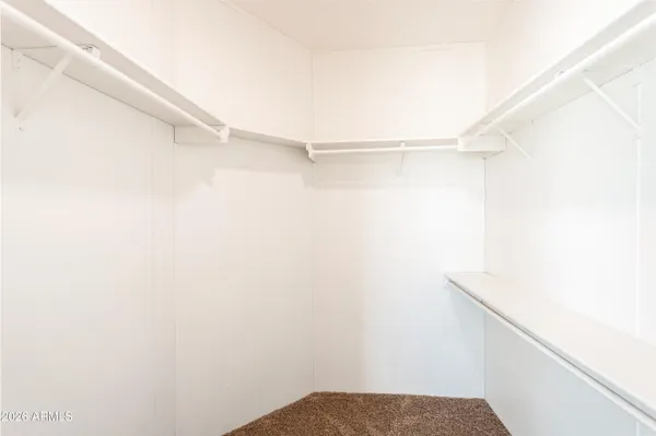 a view of small space with racks on the wall
