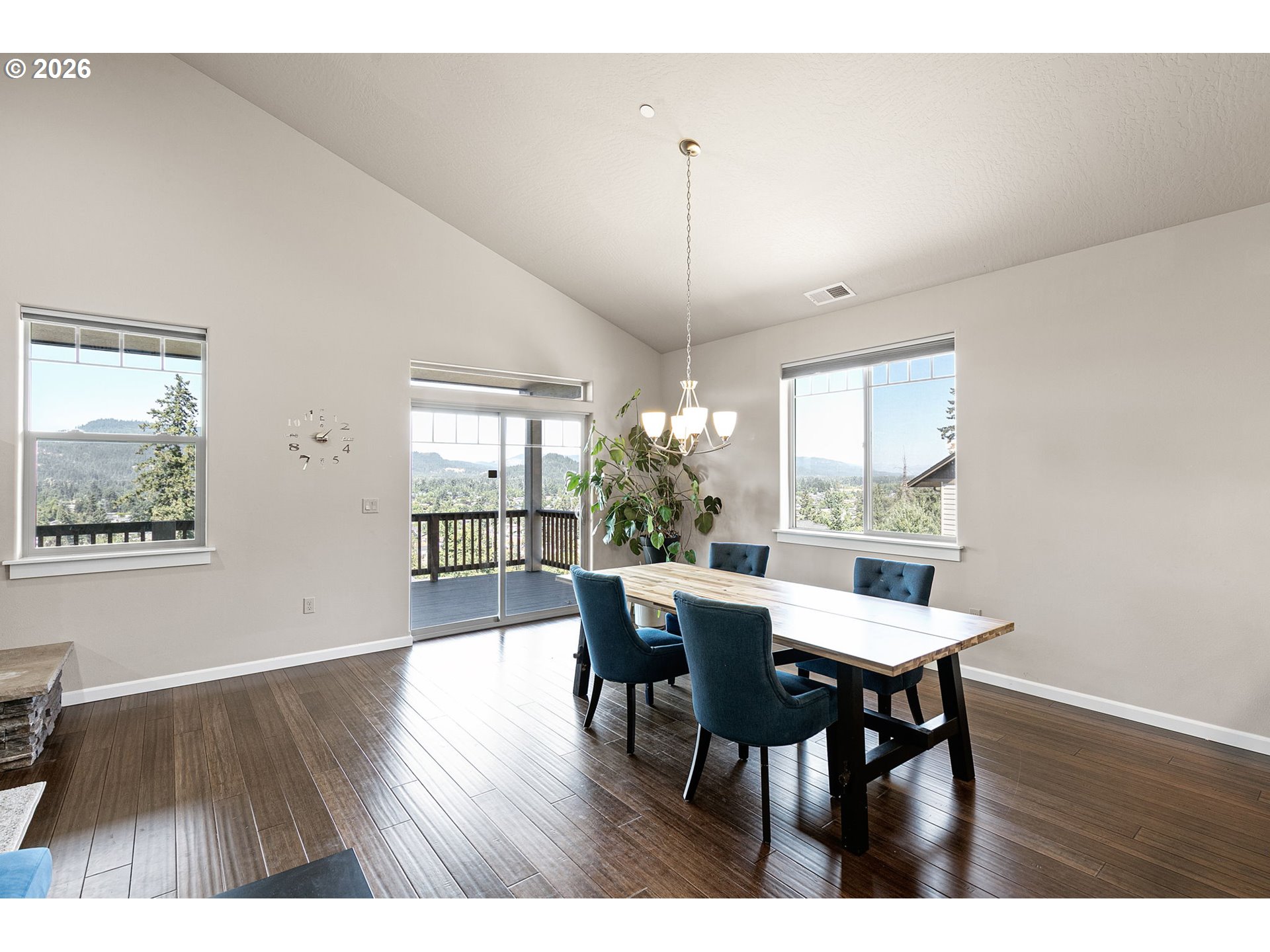 6451 Dogwood Street Springfield, OR 97478 - Photo 12 of 38 a view of a dining room with furniture wooden floor and chandelier