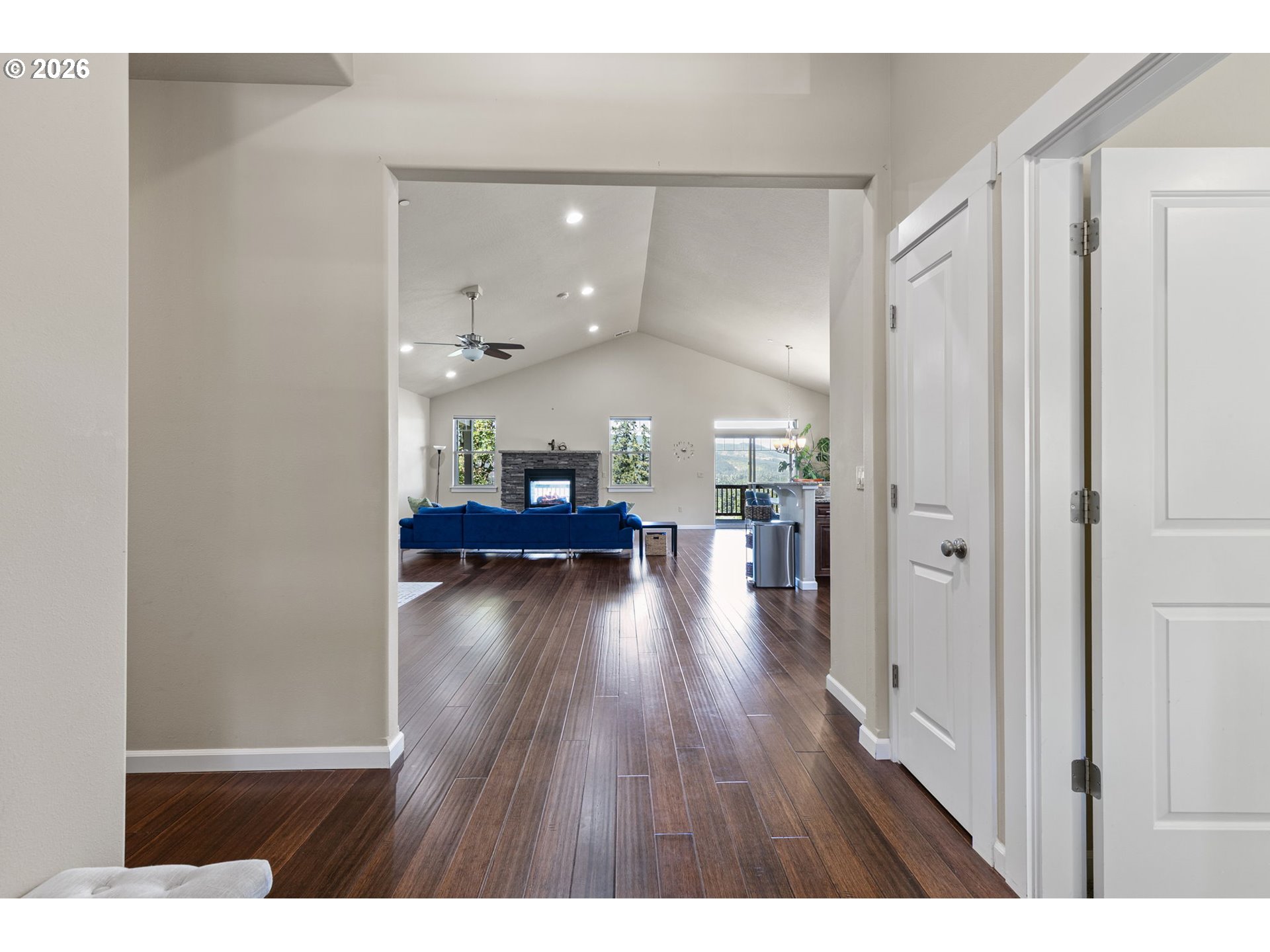 6451 Dogwood Street Springfield, OR 97478 - Photo 14 of 38 a view of a hallway view with wooden floor windows and a living room