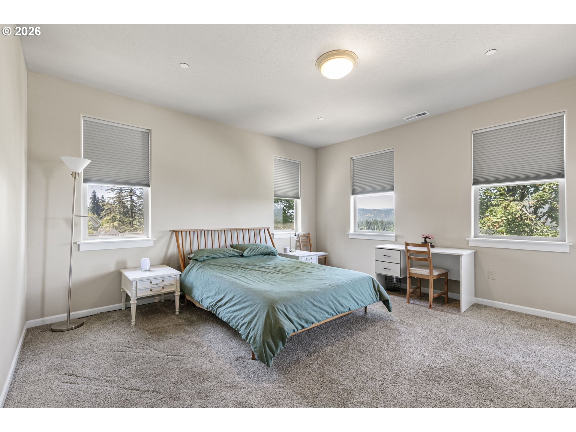 6451 Dogwood Street Springfield, OR 97478 - Photo 18 of 38 a bedroom with a bed and a table