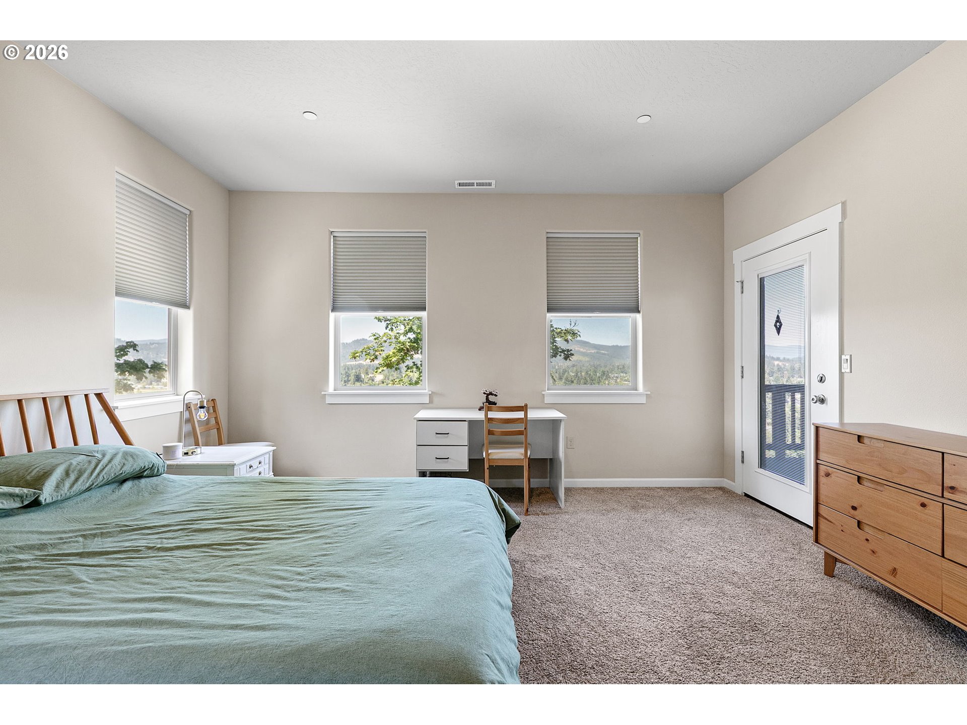 6451 Dogwood Street Springfield, OR 97478 - Photo 19 of 38 a bedroom with a bed and a desk in it
