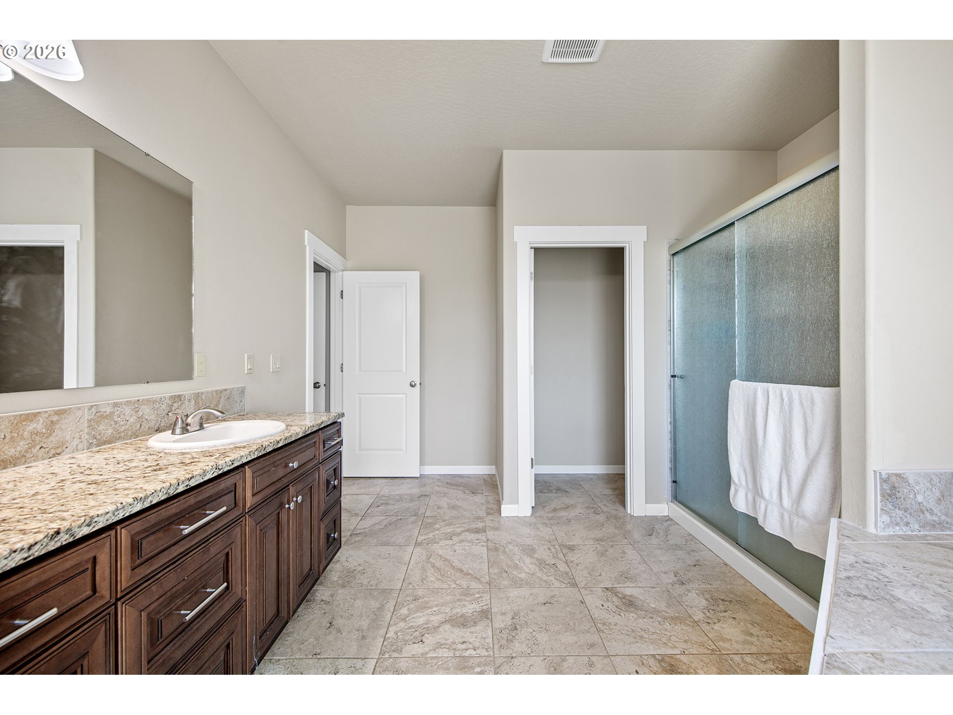 6451 Dogwood Street Springfield, OR 97478 - Photo 21 of 38 a bathroom with a granite countertop sink and a mirror