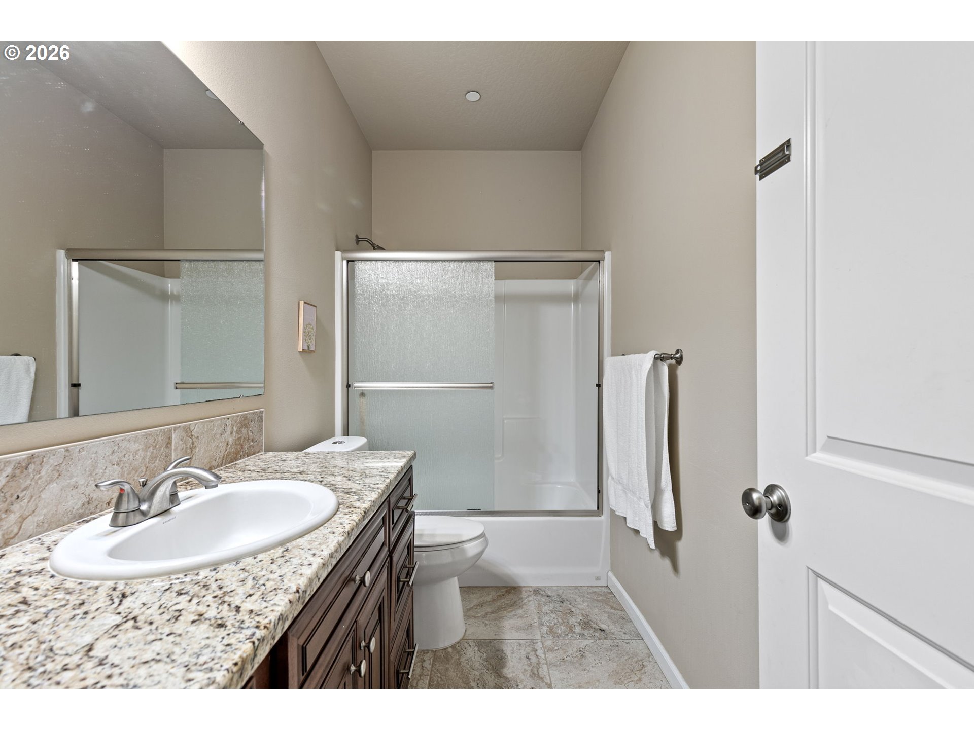 6451 Dogwood Street Springfield, OR 97478 - Photo 23 of 38 a bathroom with a sink and mirror