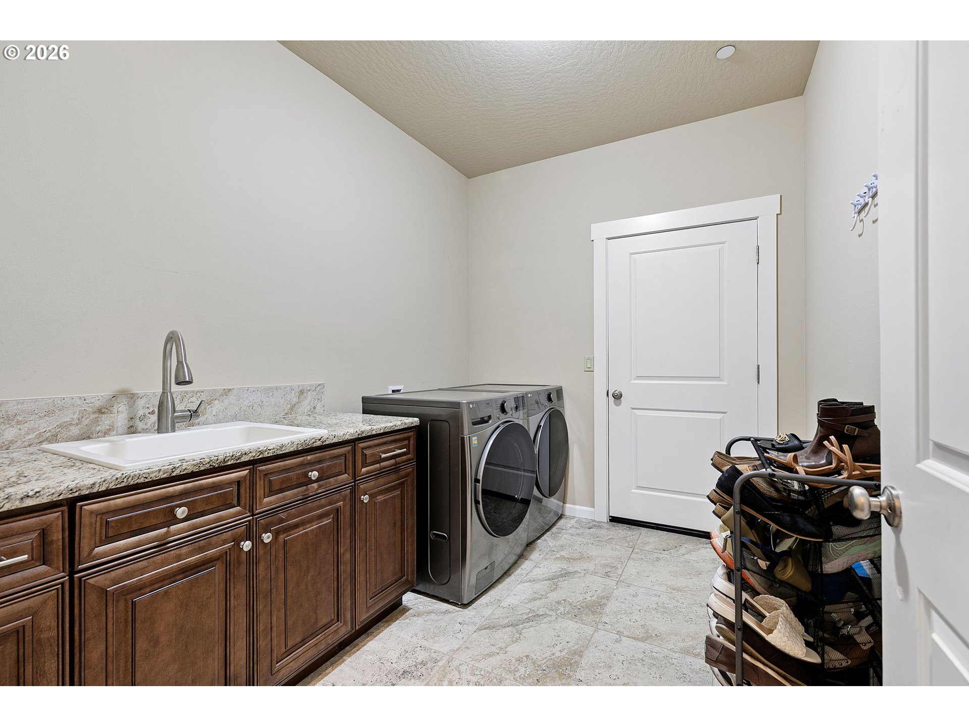 6451 Dogwood Street Springfield, OR 97478 - Photo 25 of 38 a utility room with a sink dryer and washer