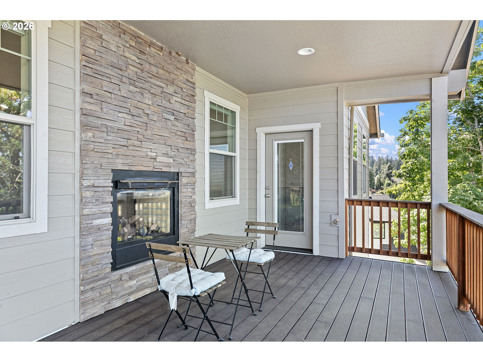 6451 Dogwood Street Springfield, OR 97478 - Photo 26 of 38 a view of a house with a porch and wooden floor