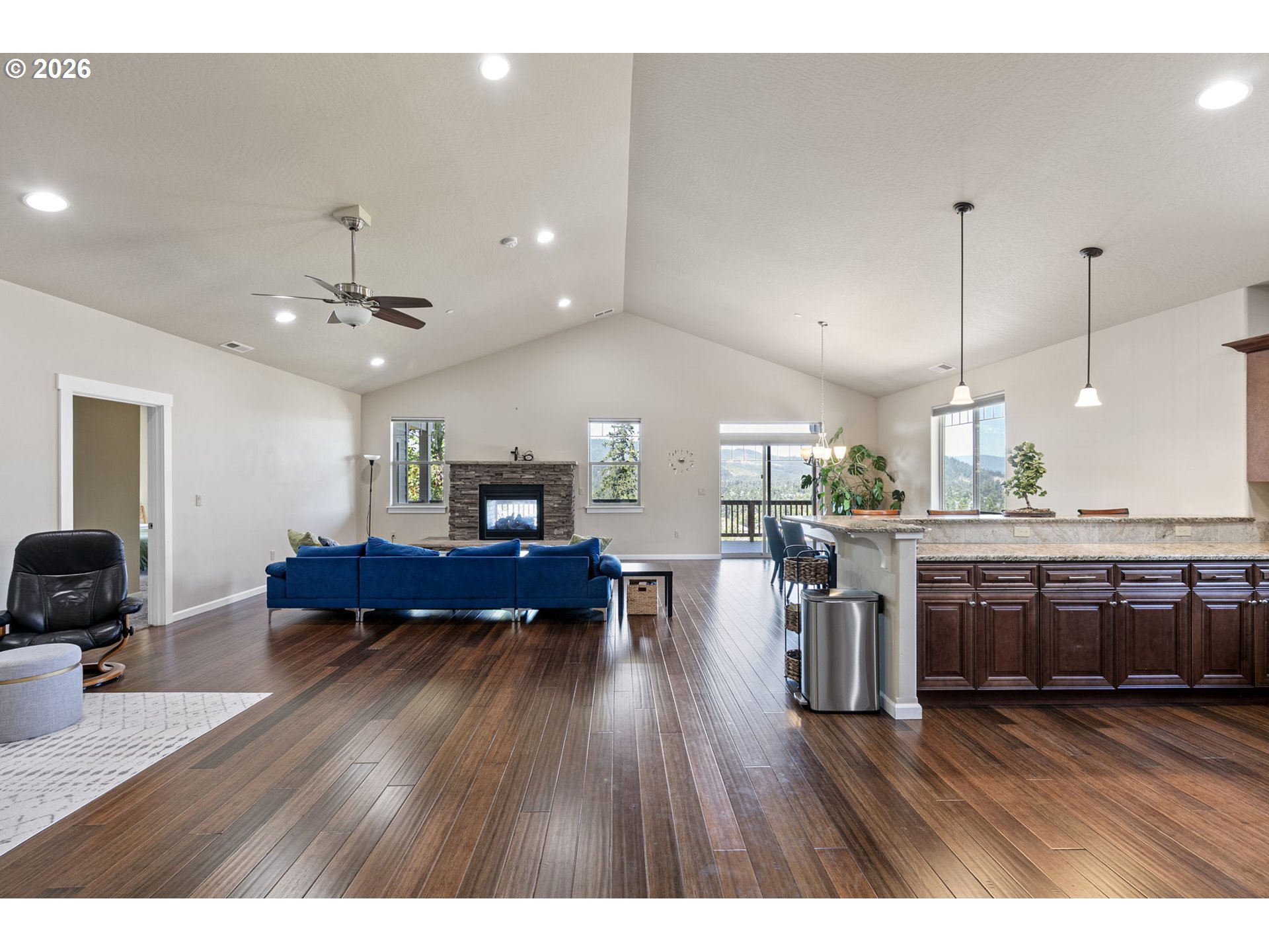 6451 Dogwood Street Springfield, OR 97478 - Photo 8 of 38 a living room with furniture and kitchen view