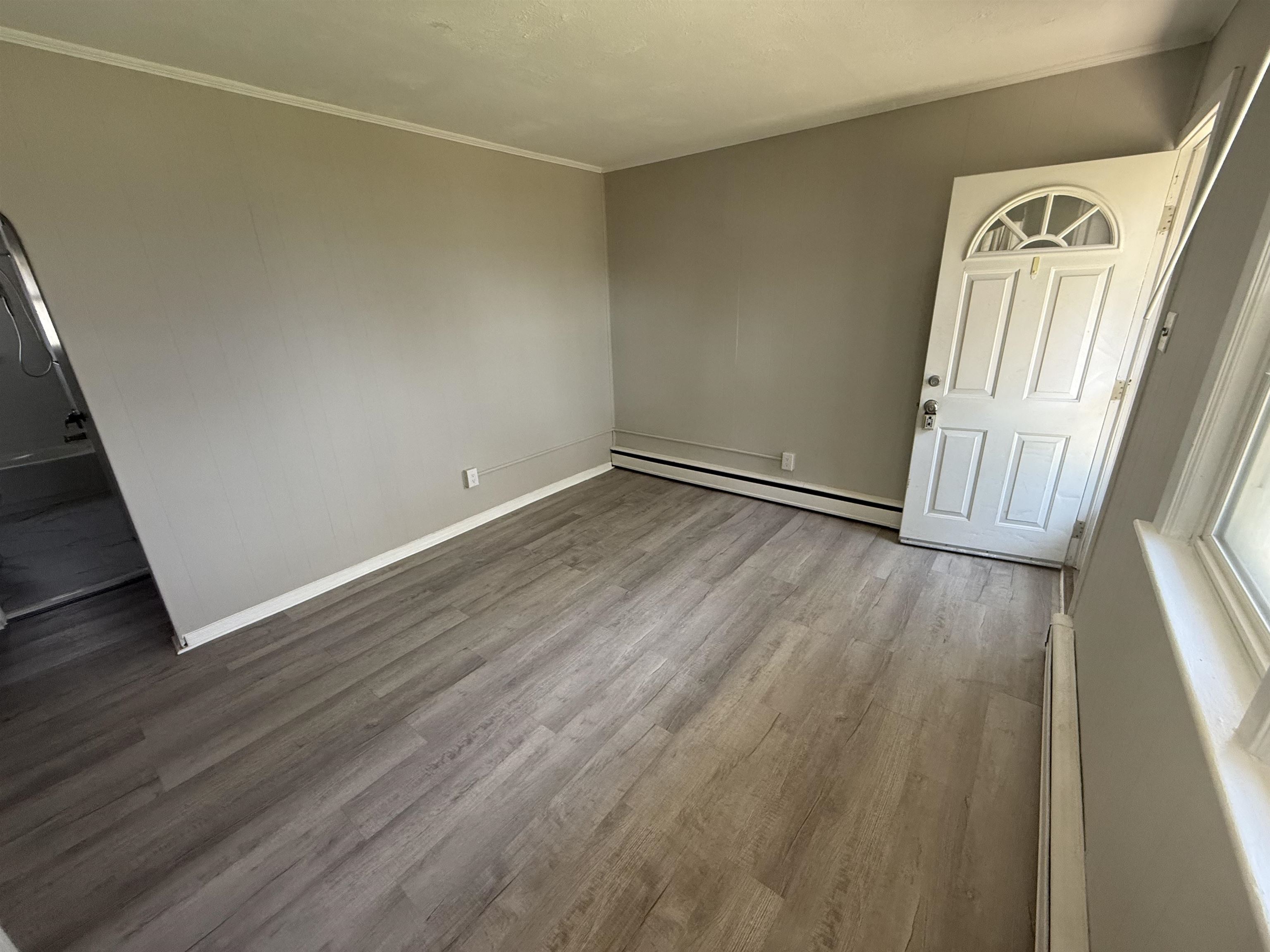 110 West Crocus Road, Unit 2 Wildwood Crest, NJ 08260 - Photo 4 of 8 a view of empty room with wooden floor