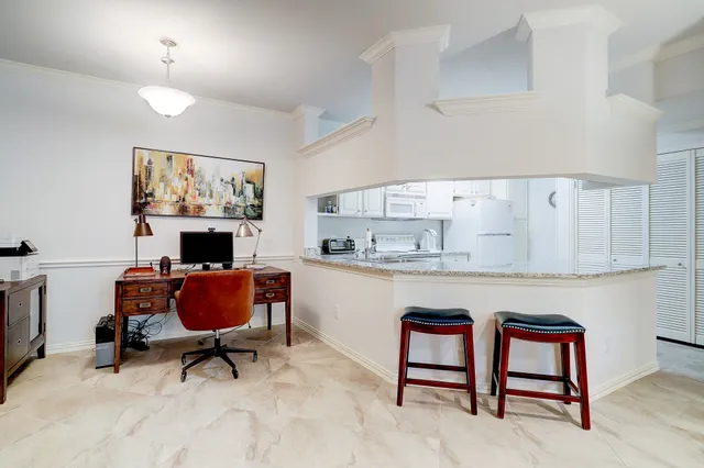 a workspace with furniture and window