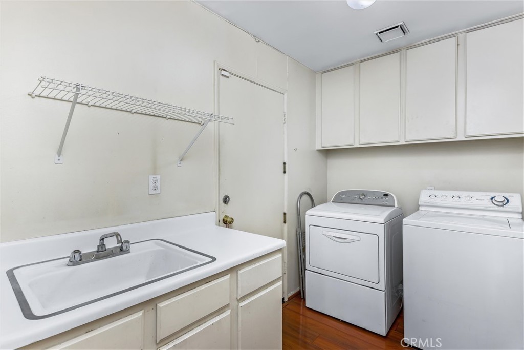 11621 Pavia Drive Rancho Cucamonga, CA 91701 - Photo 19 of 36 Laundry room with sink & hook-up for washer and dryer