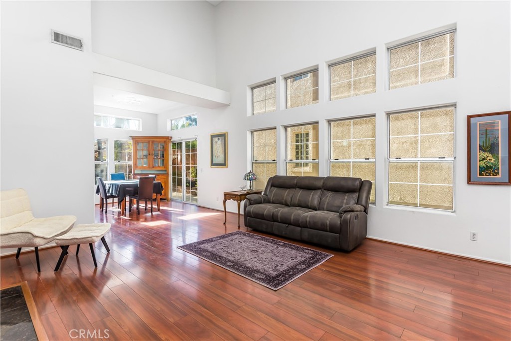 11621 Pavia Drive Rancho Cucamonga, CA 91701 - Photo 9 of 36 Living room with plenty of windows for ample natural lighting
