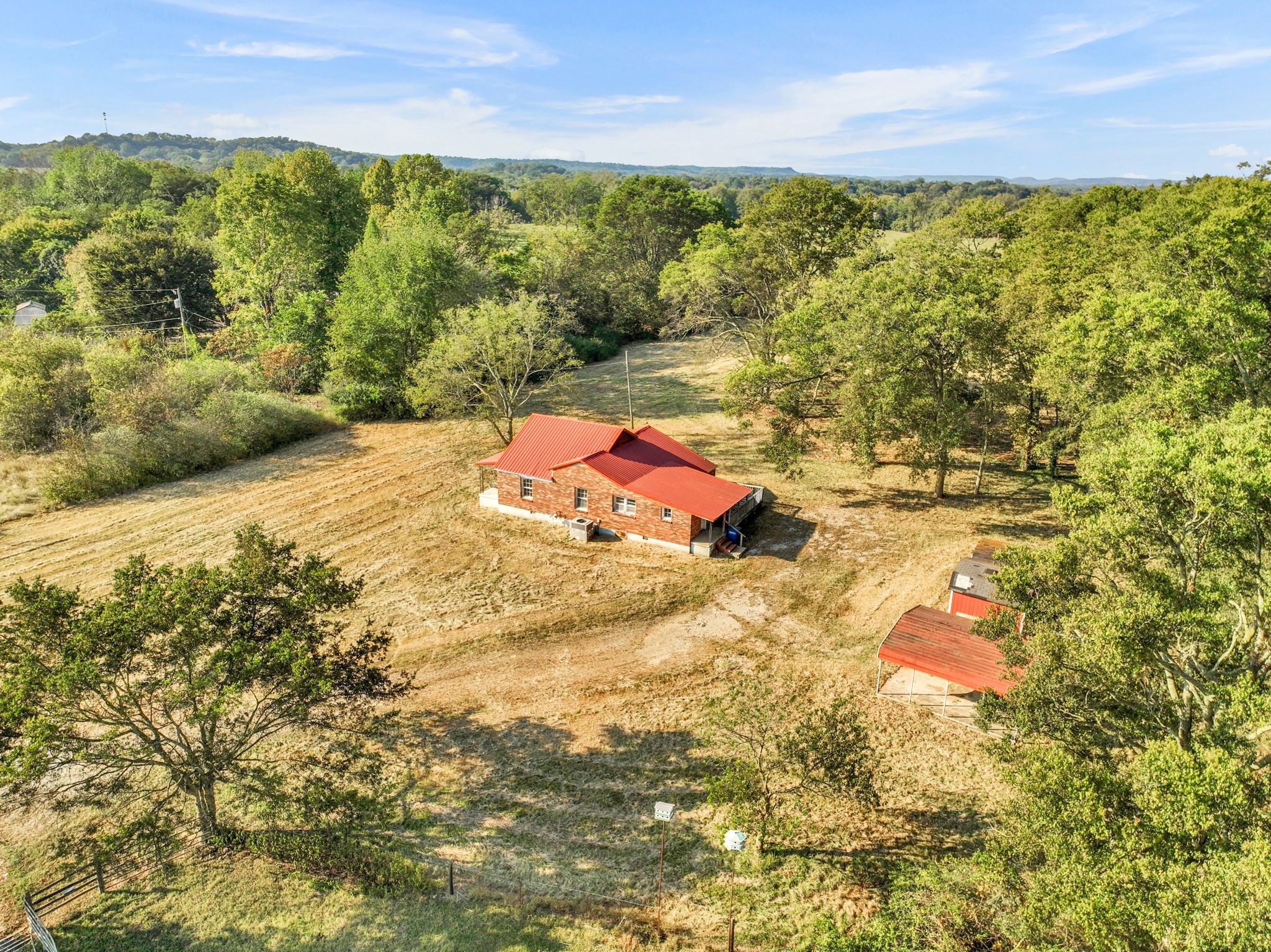 535 Scott Road Mount Pleasant, TN 38474 - Photo 27 of 40 a view of an outdoor space and a yard