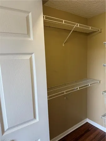 a view of a room with racks on the wall