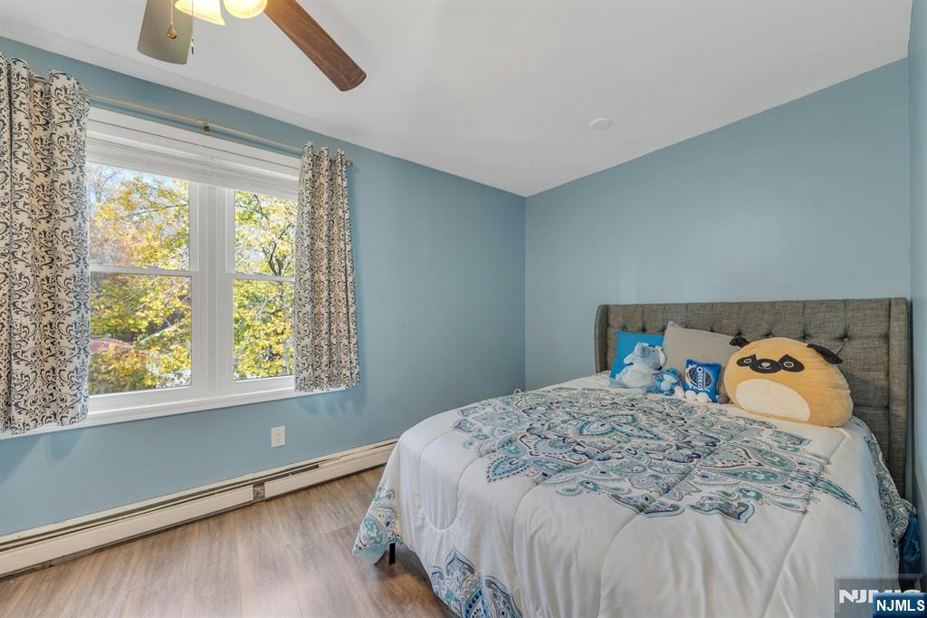 39 Delaware Road West Milford, NJ 07421 - Photo 24 of 37 a bedroom with a bed and a window