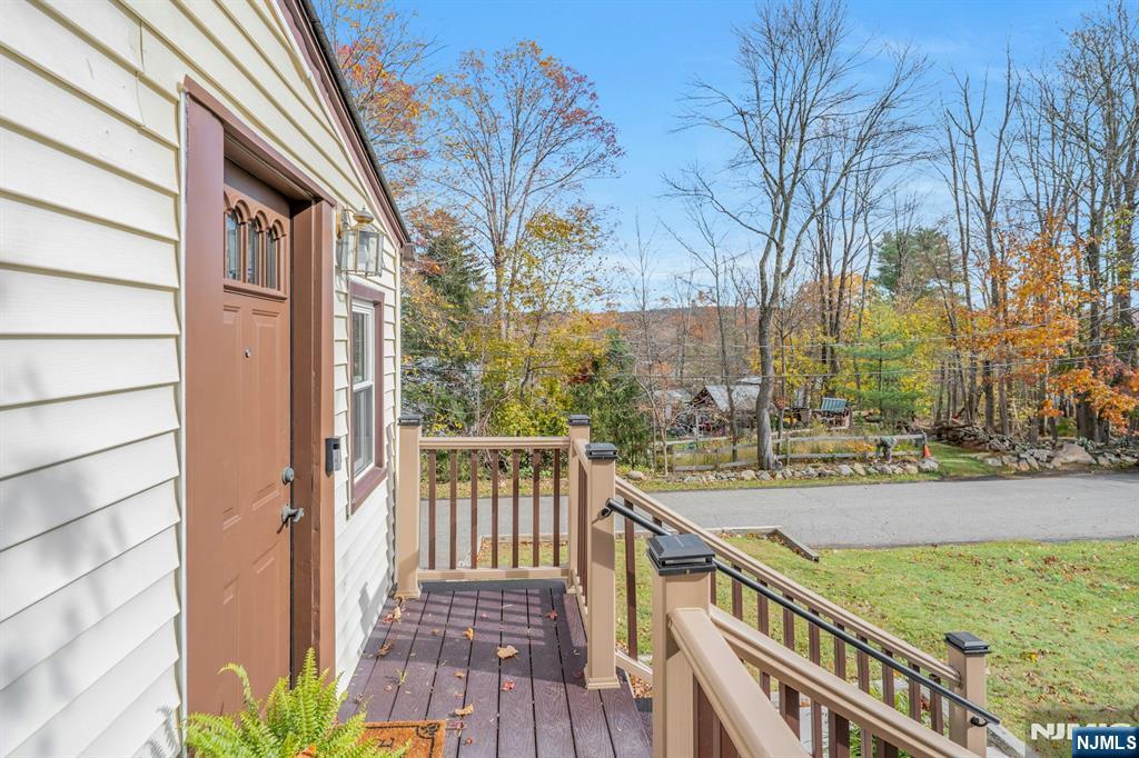 39 Delaware Road West Milford, NJ 07421 - Photo 4 of 37 a view of a balcony with wooden fence