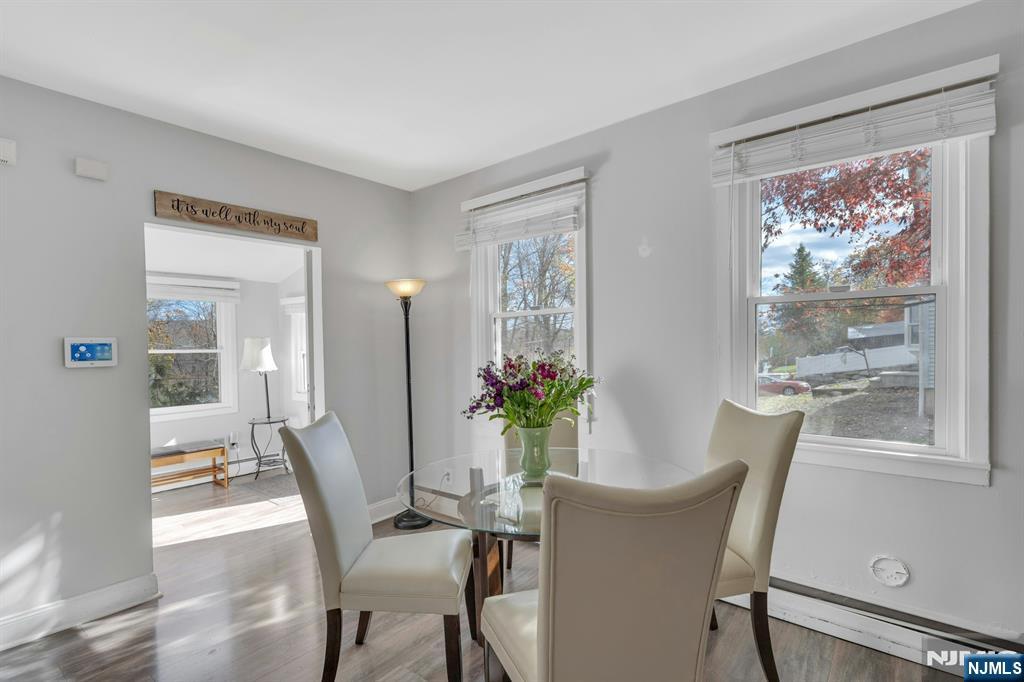 39 Delaware Road West Milford, NJ 07421 - Photo 6 of 37 a view of a dining room with furniture window and wooden floor