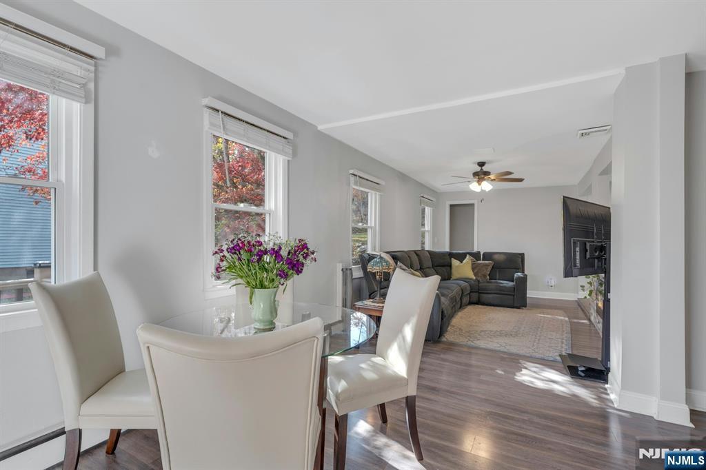 39 Delaware Road West Milford, NJ 07421 - Photo 7 of 37 a view of a dining room with furniture window and wooden floor