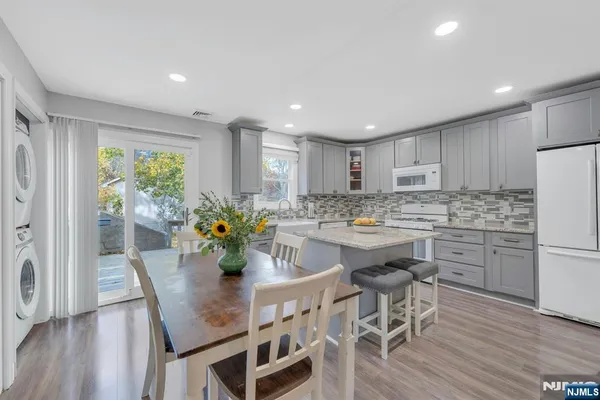 a view of a balcony with yard