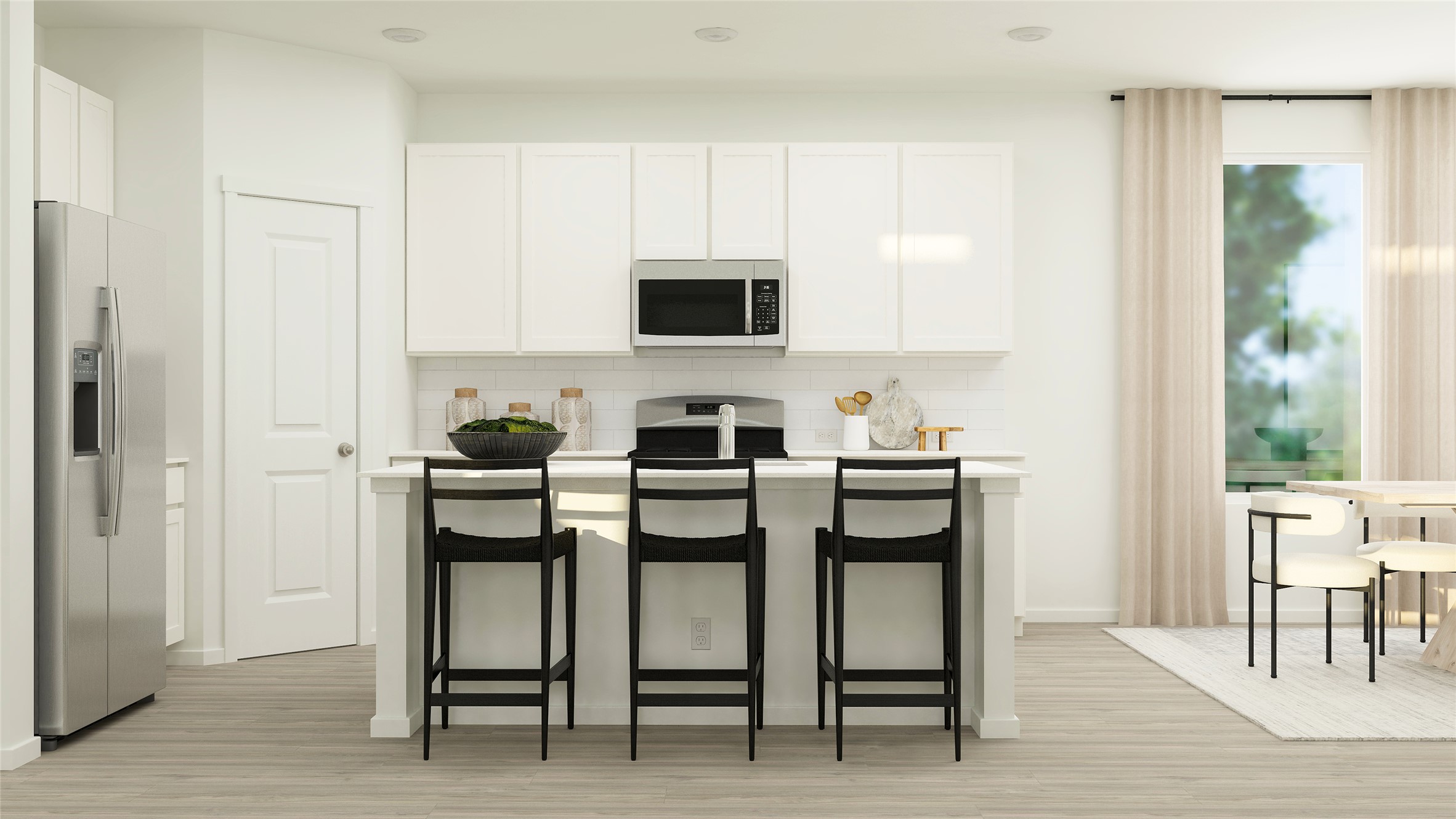 17916 Prairie Falcon Way Pflugerville, TX 78660 - Photo 28 of 28 a kitchen with white cabinets and stainless steel appliances