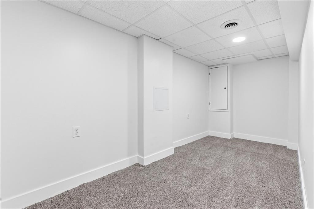 111 Crest Drive Monaca, PA 15061 - Photo 23 of 37 an empty room with an entryway