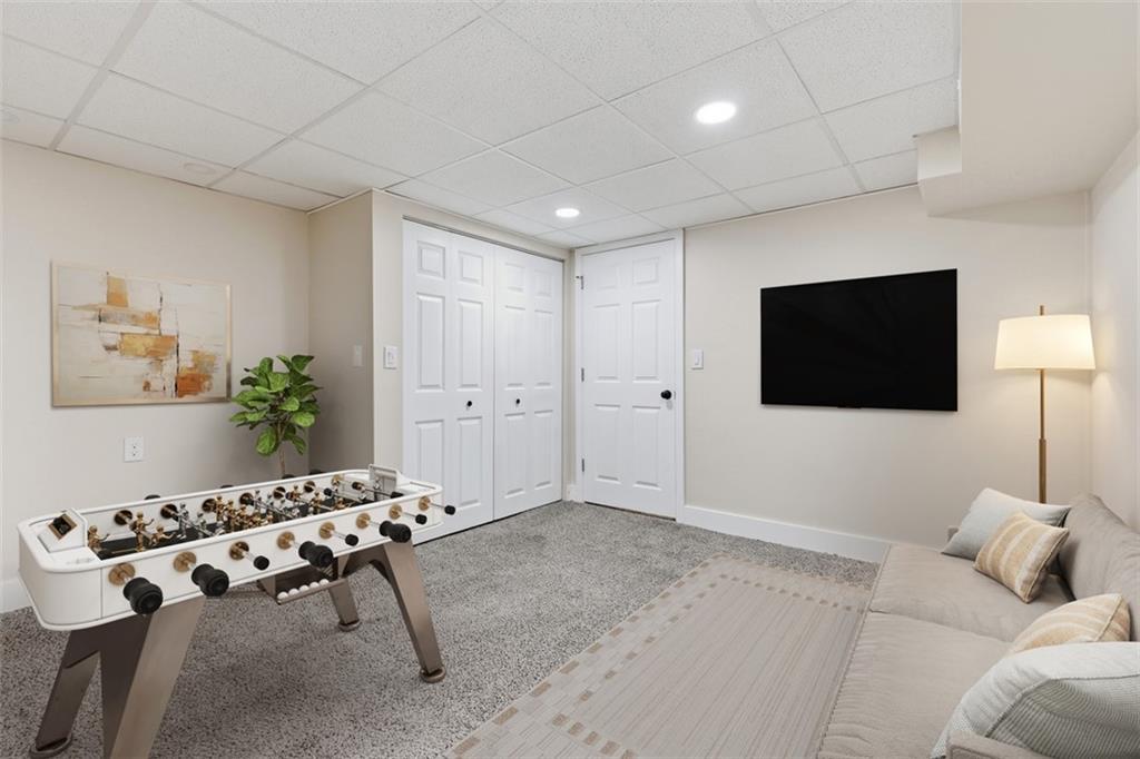 111 Crest Drive Monaca, PA 15061 - Photo 24 of 37 a living room with furniture and a flat screen tv