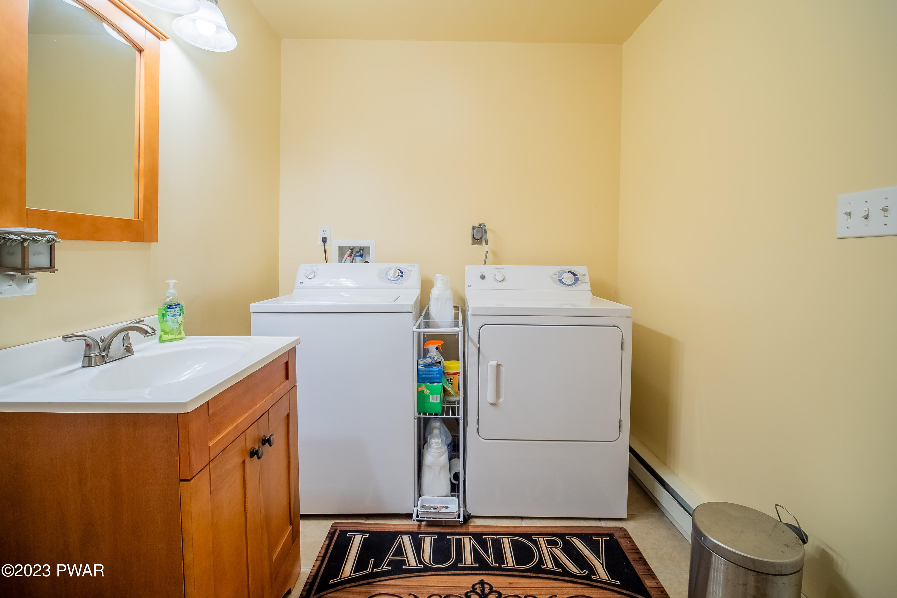 493 Northgate Road Lake Ariel, PA 18436 - Photo 32 of 37 a utility room with dryer and washer
