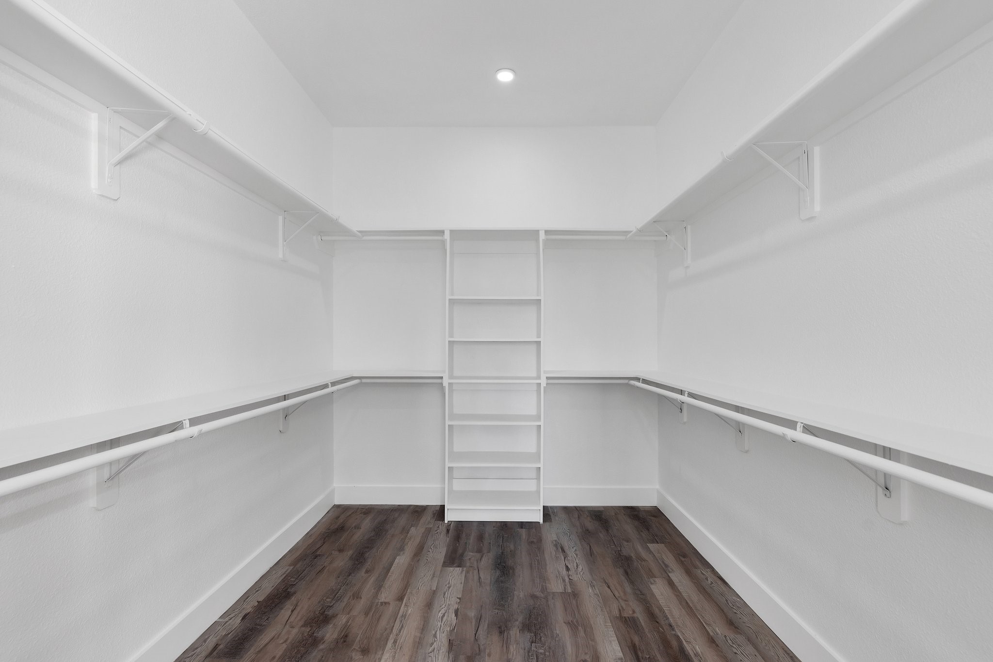 519 Chuckwagon Trail Angleton, TX 77515 - Photo 21 of 34 a view of an empty walk in closet